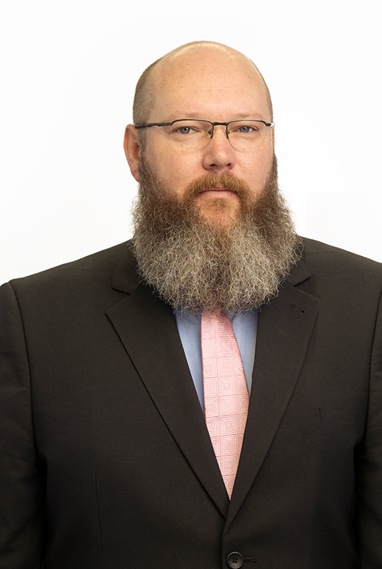 Headshot of Scott K. Koelker